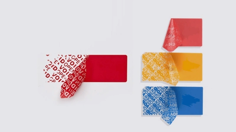 Tamper-evident labels, showing "VOID OPEN" pattern