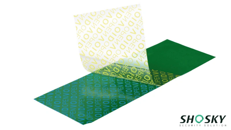 Green tamper-evident label peeling to reveal "VOID OPENED
